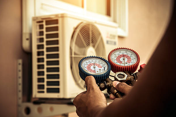 Professional Hvac Maintenance technician working in Hampton, NH